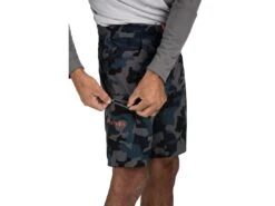 Simms Seamount Board Shorts -Simms || 13 Fishing || Huk Shop simms seamountboardshorts woodlandcamostorm lifestyle1 51 20 sim 10000