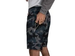 Simms Seamount Board Shorts -Simms || 13 Fishing || Huk Shop simms seamountboardshorts woodlandcamostorm lifestyle2 51 20 sim 10000